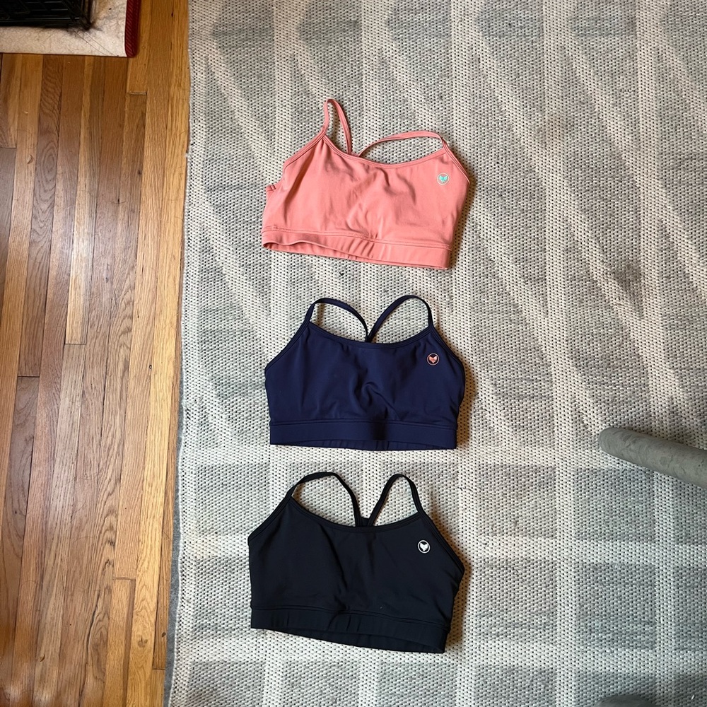 Alpha forward sports bras